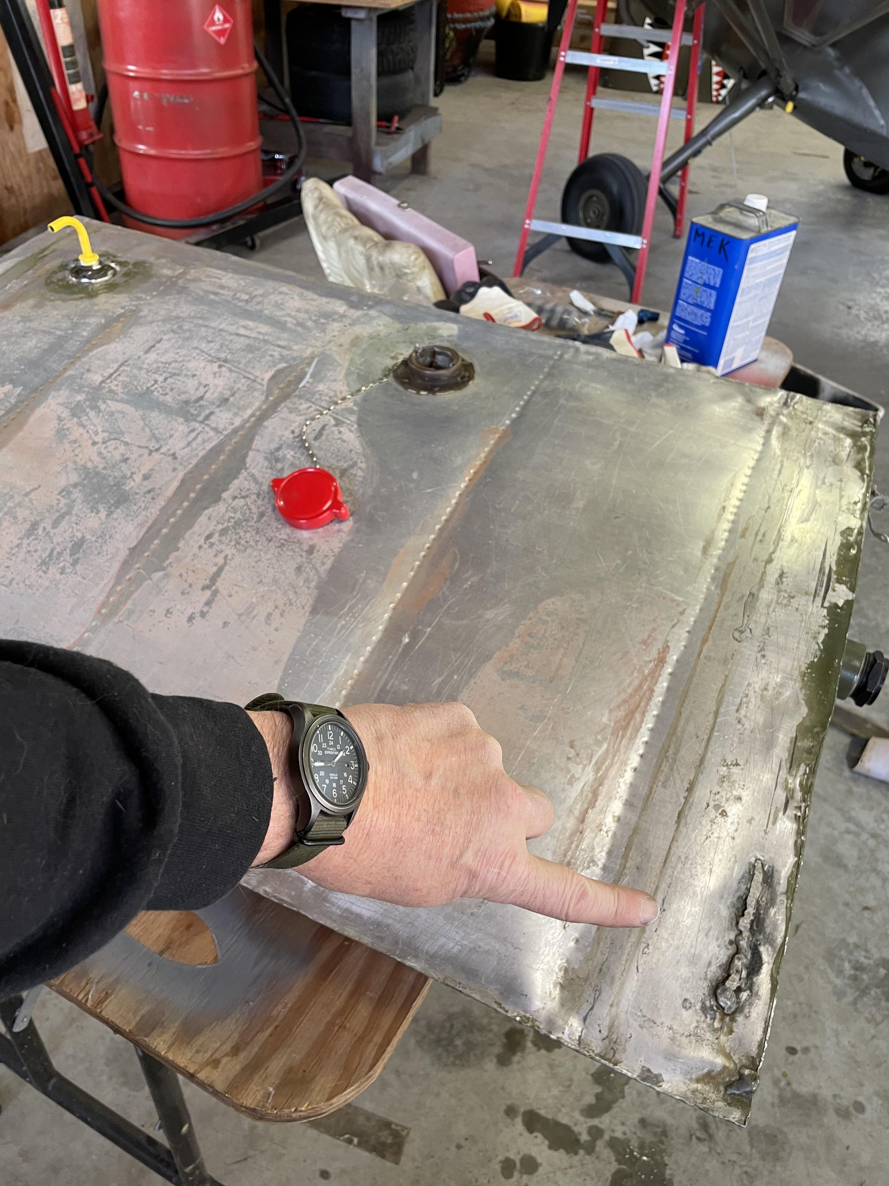 Damaged area before repair